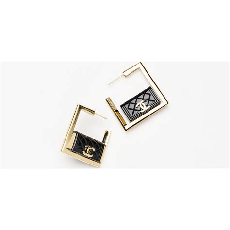 chanel black metal & resin earrings|chanel reissue.